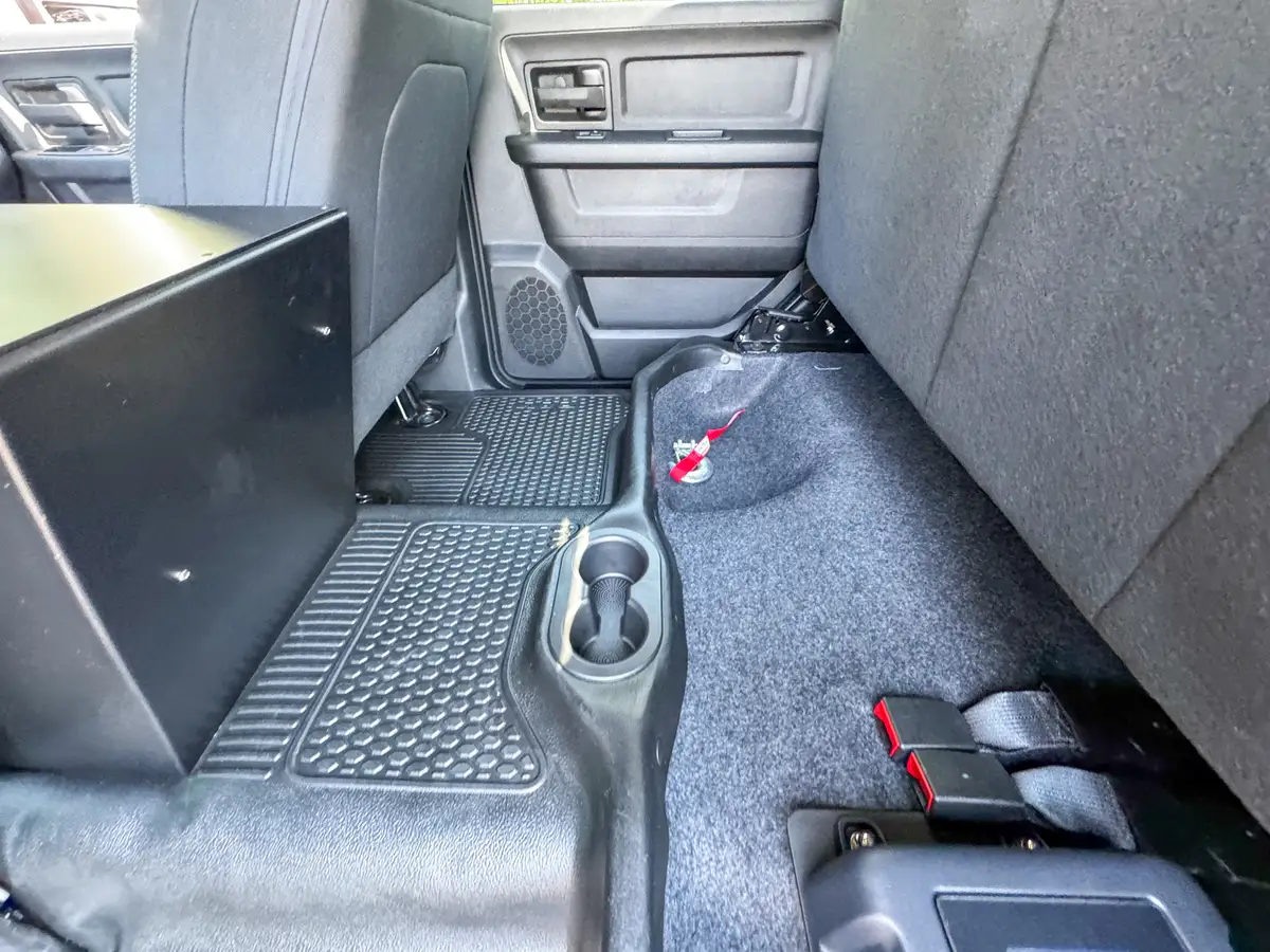 Rear door open exterior view showing access to crew-cab seating.